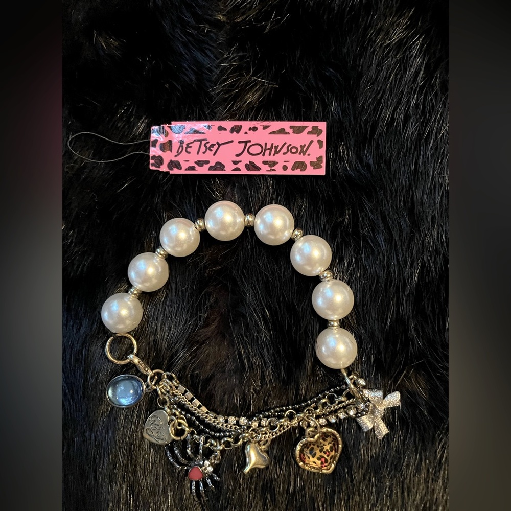 Betsey Johnson faux pearl, bow, hearts, spider and blue stone bracelet NWOT.